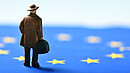 travel, traveler, trip, man, gentleman, traveling, person, people, toy, miniature, macro, mini, small, little, figurine, figure, adventure, adventurer, suitcase, luggage, holidays, vacation, tourist, tourism, escape, escaping, run, away, emigration, emigrant, immigration, immigrant, migrant, migration, work, worker, abroad, moving, exile, political, asylum, seeker, seeking, retro, vintage, Europe, European, Union, flag, horizontal